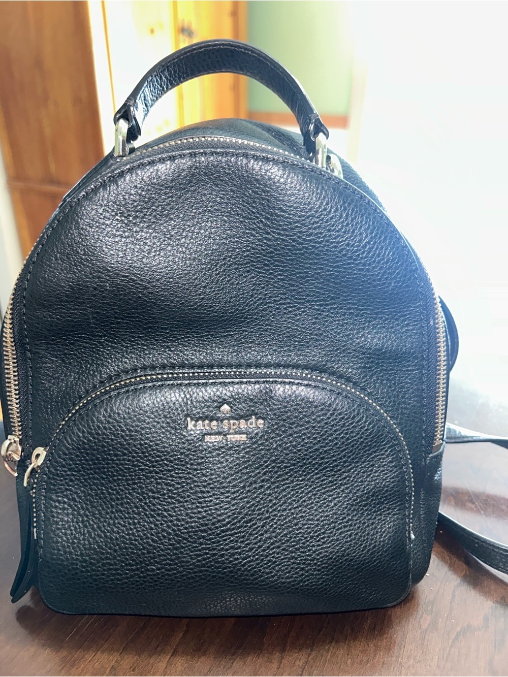 kate spade black pebbled leather backpack with gold hardware